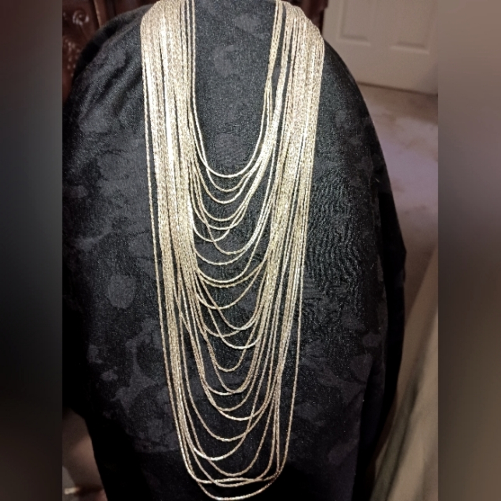 Silver tone multi strand necklace
